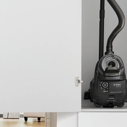 Bosch Serie 4 bagless vacuum cleaner in use on carpet