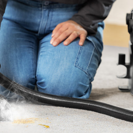 BISSELL SpotClean HydroSteam 3700E with stain tool attached